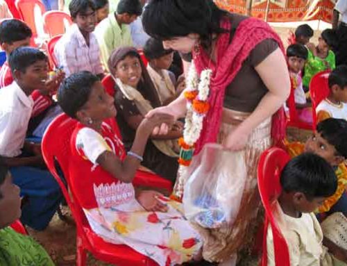 Owner Elissa Macpherson handing out presents from Stanthorpe at an orphanage in India